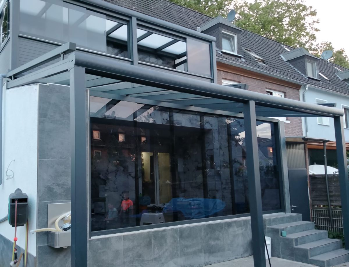 Sliding Glass System — framed glass panels for winter garden